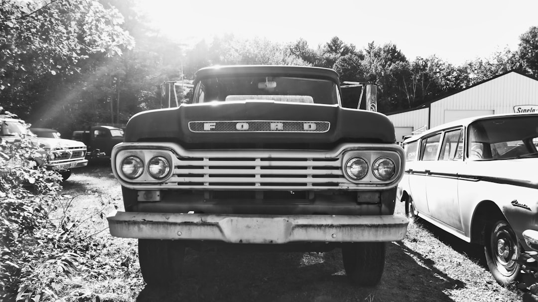 grayscale photo of classic car | The National Recycling Corporation