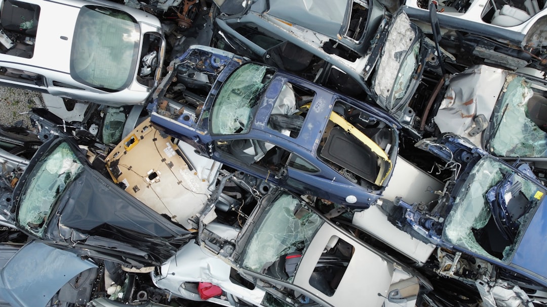 Pile of wrecked and crushed cars | The National Recycling Corporation