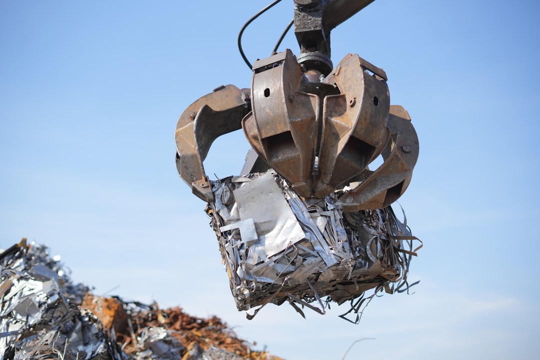 A large metal object flying through the air | The National Recycling Corporation