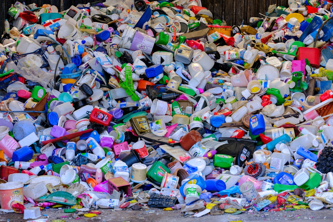 A pile of plastic bottles sitting on top of a street | The National Recycling Corporation
