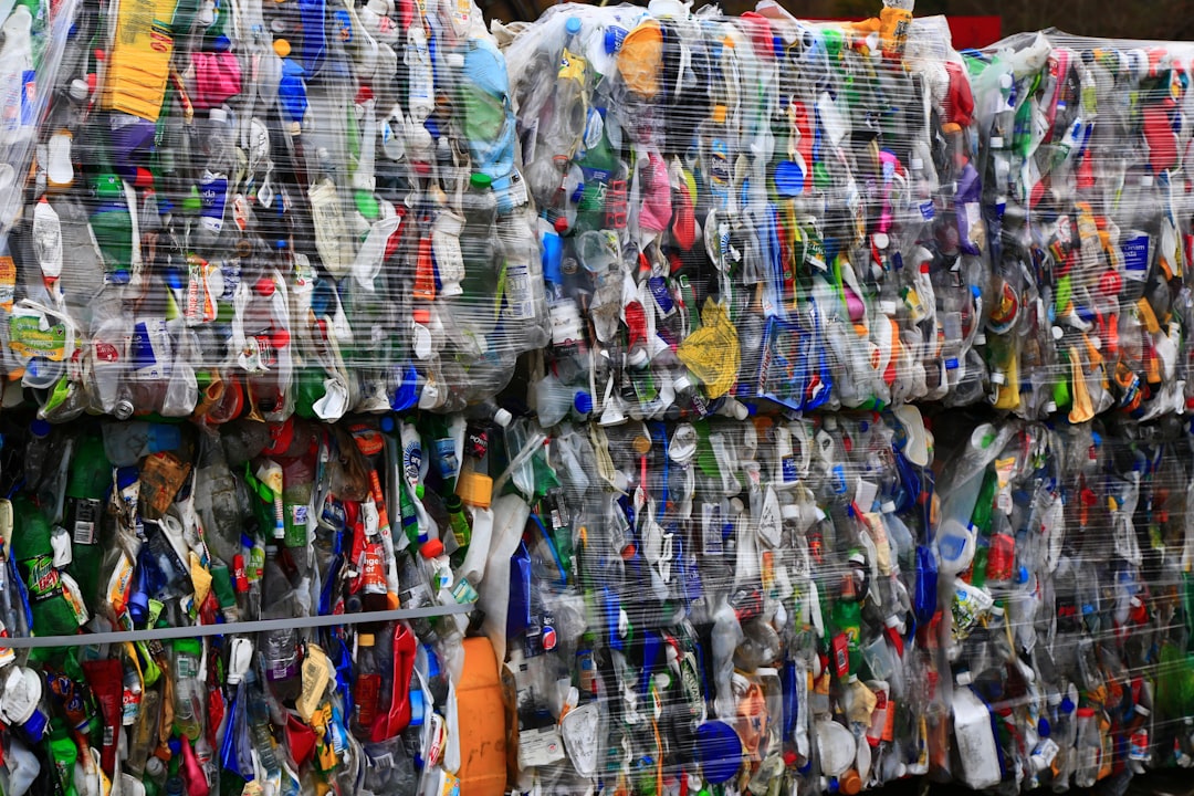assorted clothes hanging on rack | The National Recycling Corporation