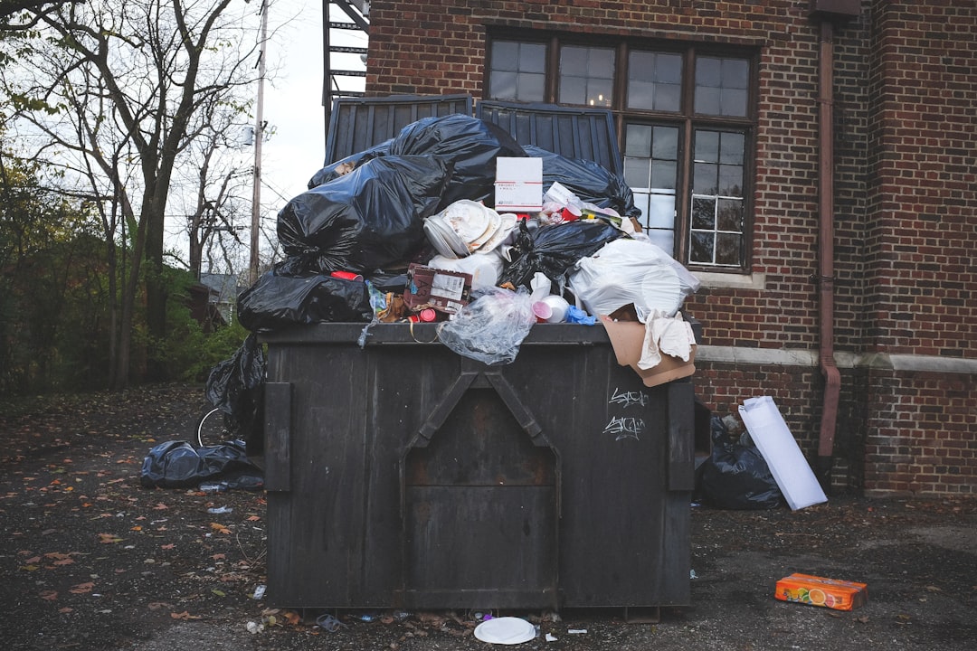 black trash bin | The National Recycling Corporation